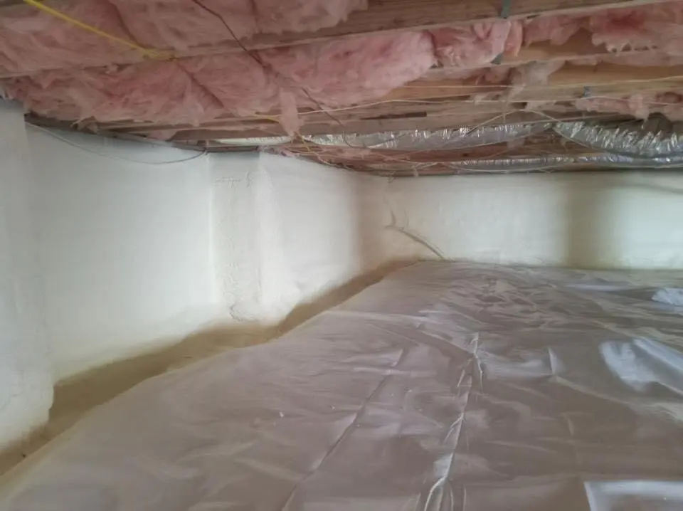 Crawl space encapsulation with closed-cell spray foam for Flat Roof Repair in Napoleon